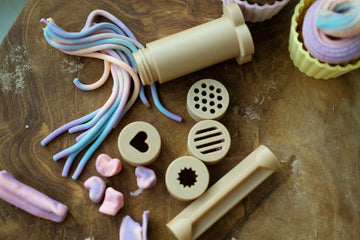 Eco dough extruder kit displayed with rainbow playdough strands and eco accessories—perfect for sensory and imaginative play.
