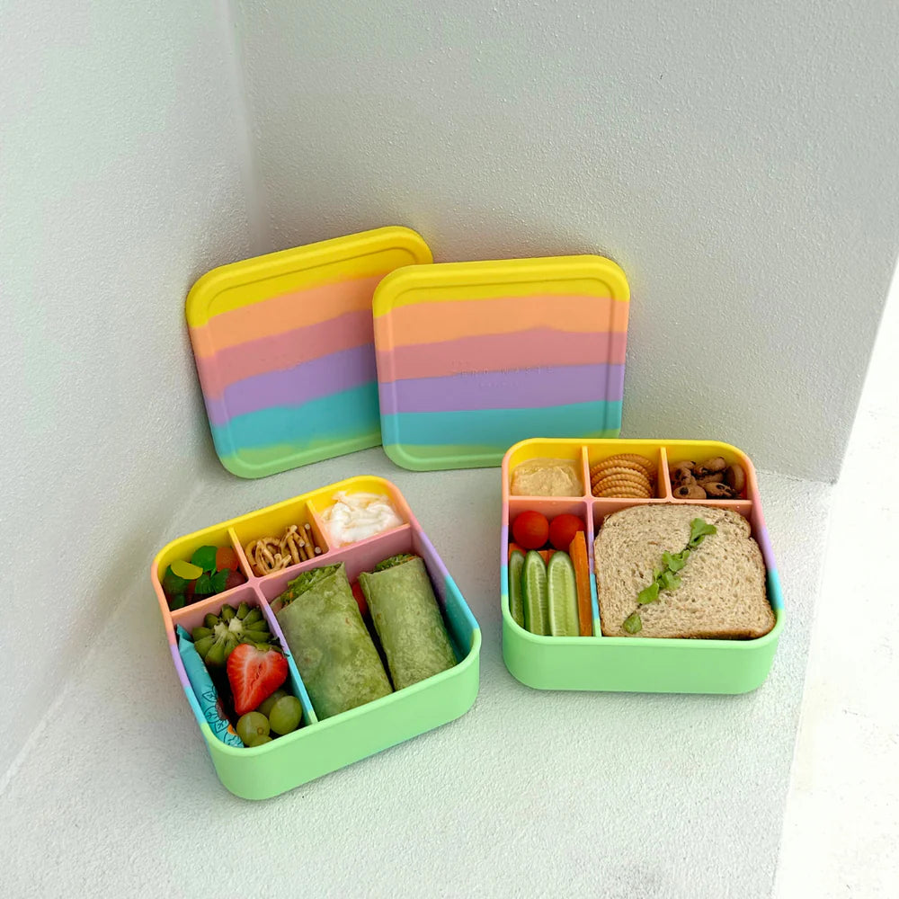 Two Big Bento Rainbow lunchboxes filled with wraps and healthy snacks – colourful and reusable lunch containers for kids and adults.