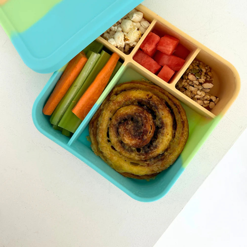 Big Bento Splice lunchbox packed with a scroll, carrots, and crackers—sustainable and colourful lunchbox for school or work.