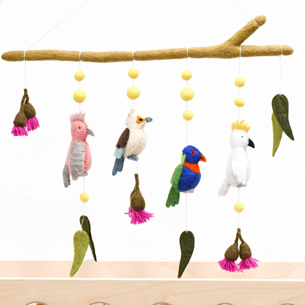 Handmade Australiana-themed hanging featuring felt birds including a Cockatoo, Rainbow Lorikeet, Kookaburra, and Galah, surrounded by gum leaves, blossoms, and yellow wattle flower pompoms