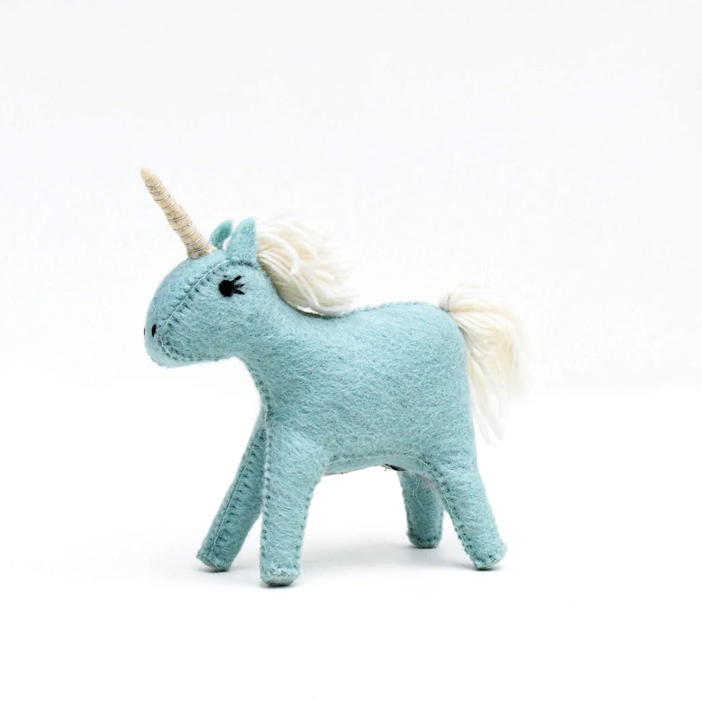 Close-up of blue felt unicorn toy with white mane, light grey tail, and golden horn, handcrafted by Tara Treasures.