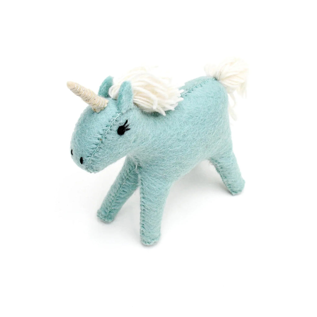 Front angle of handmade blue felt unicorn toy standing upright on white background.