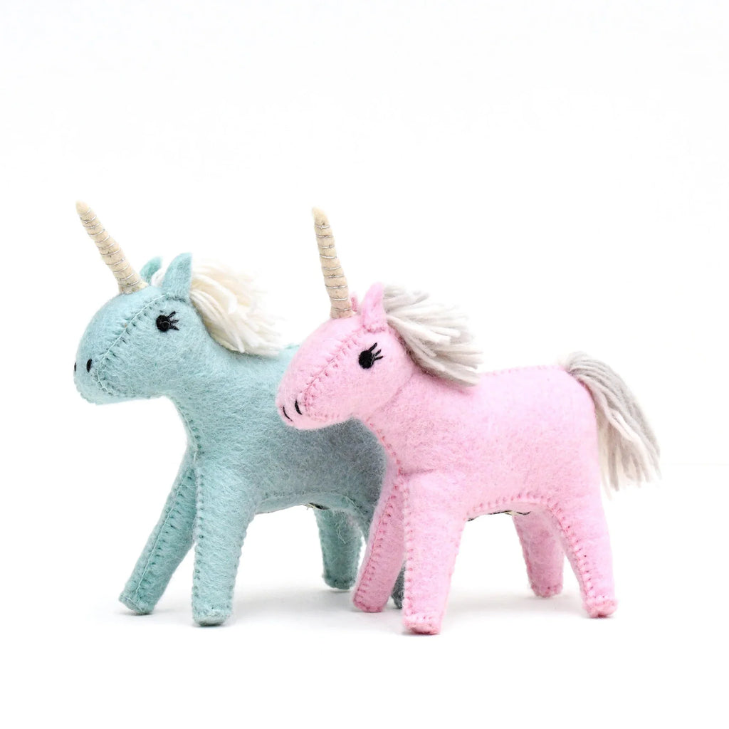 Pink and blue felt unicorn toys side by side, handmade by women artisans, perfect for eco-conscious gifting.