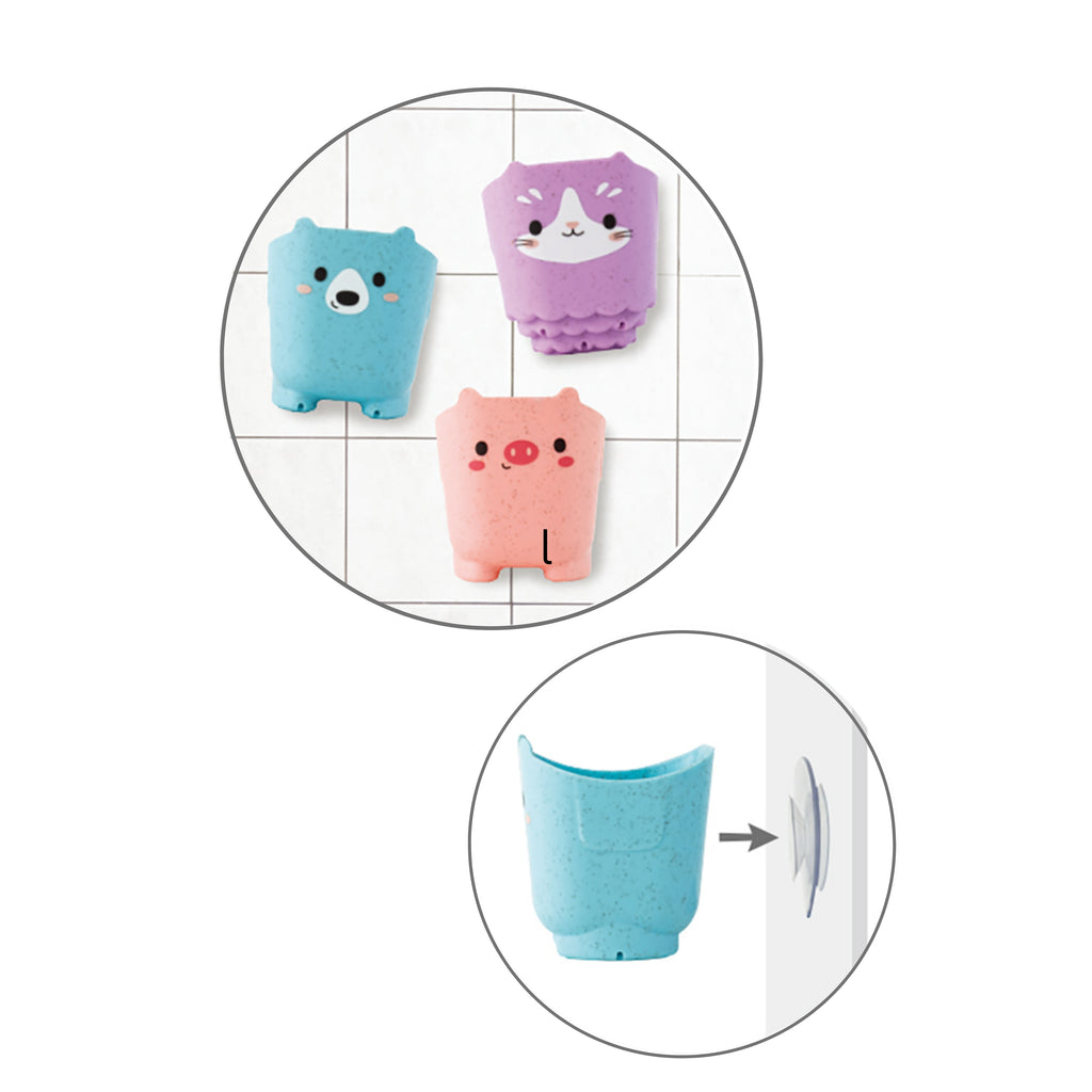 Illustration showing an animal cup with removable suction base and water flow holes underneath, explaining how the toy creates different water effects.