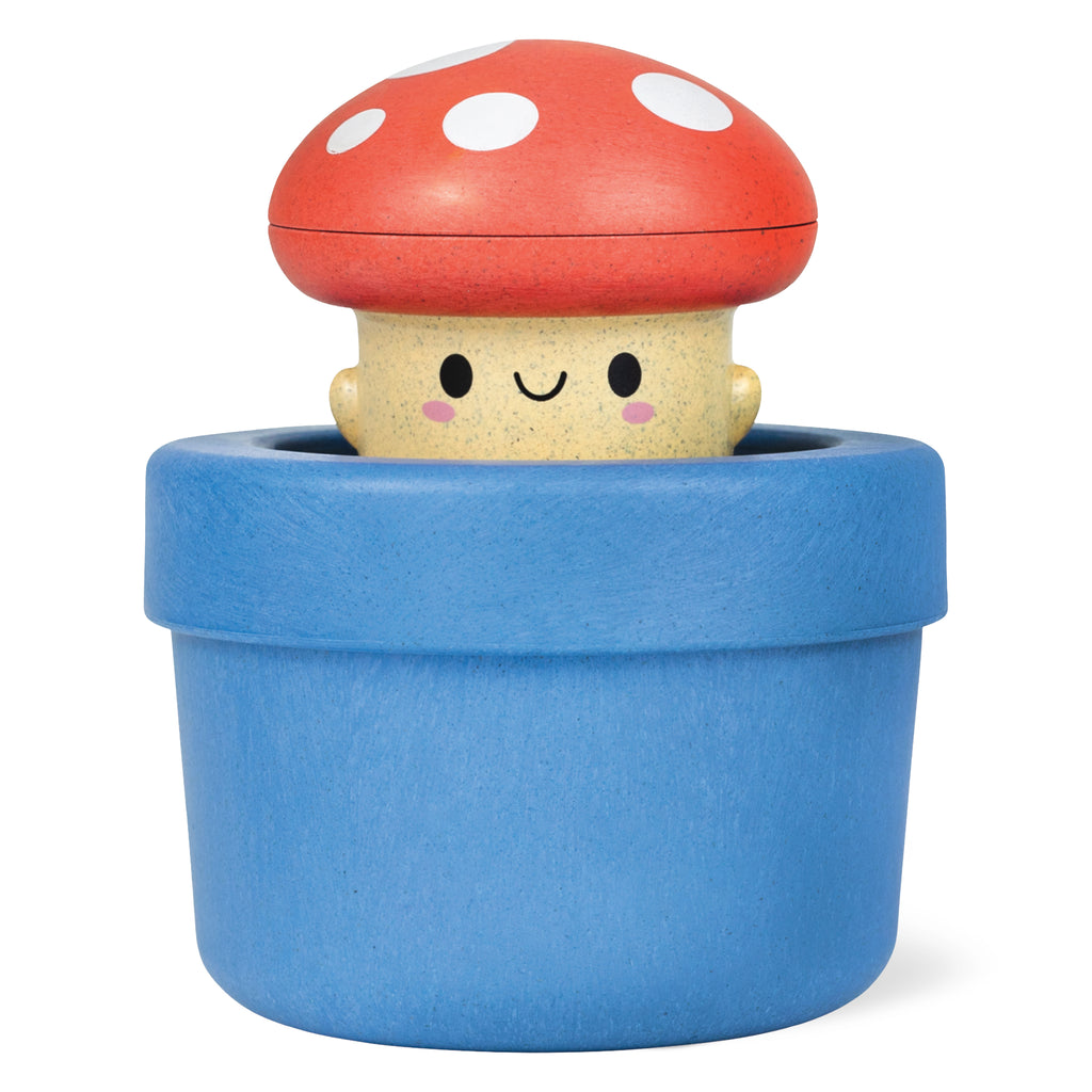 Close-up of the Mushroom bath toy with red cap and blue base, mushroom character popped up and ready for bath time fun.