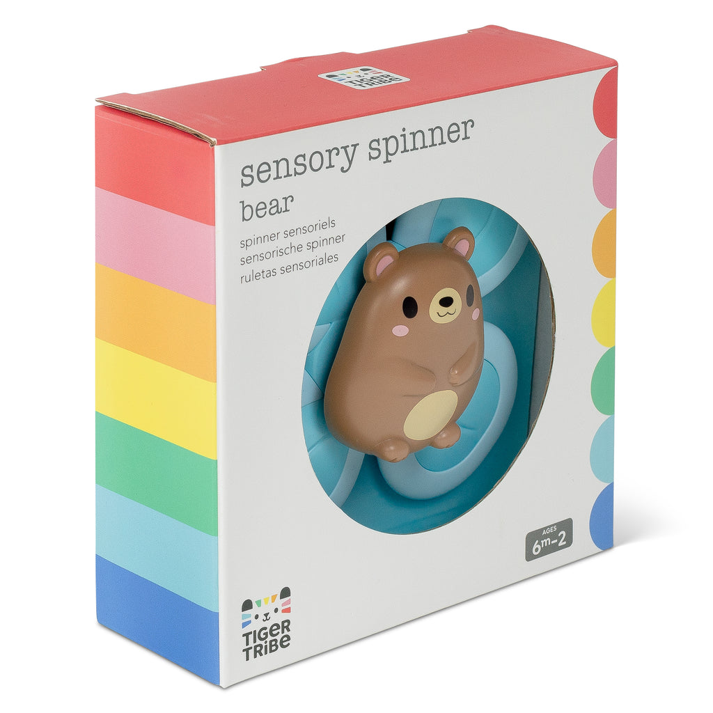 Side view of Bear Sensory Spinner packaging highlighting the product’s soft pastel palette and compact gift-ready box design.
