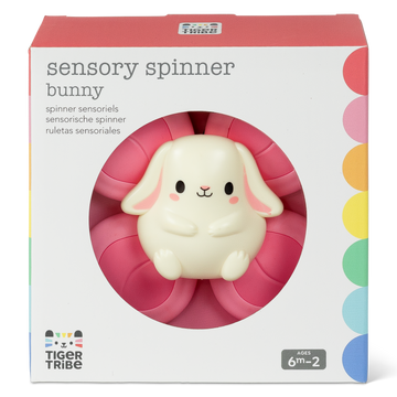 Tiger Tribe Sensory Spinner Bunny in packaging, featuring a cute white bunny at the centre of a pink four-paddle spinner, designed for sensory play from 6 months+.
