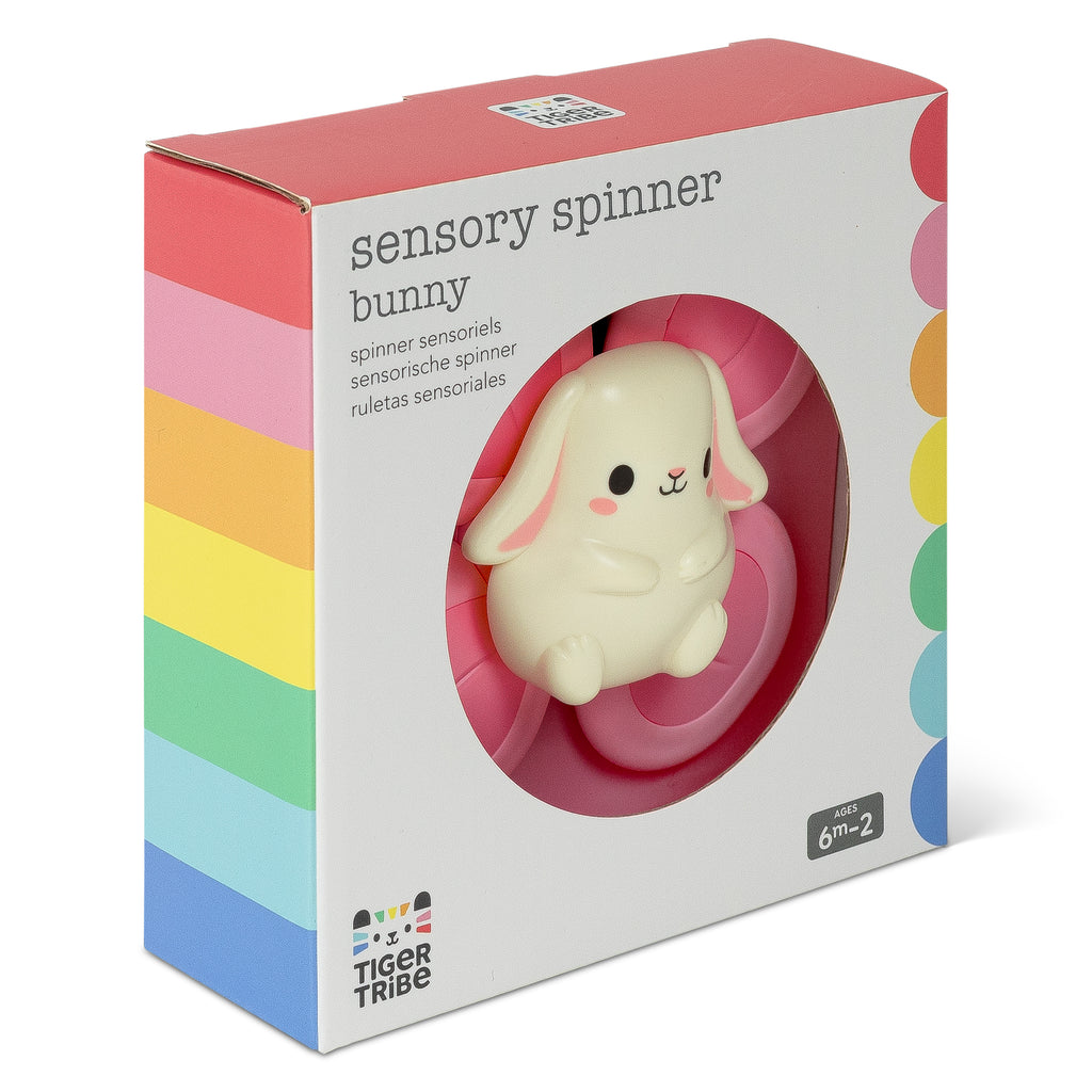 Side view of Bunny Sensory Spinner box with pastel rainbow stripes, showcasing compact and giftable packaging perfect for baby sensory toys.