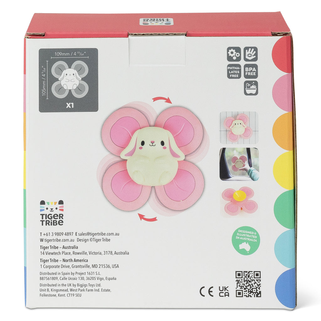 Back of the Bunny Sensory Spinner box with product features and icons highlighting safety testing, BPA-free materials, and developmental benefits.