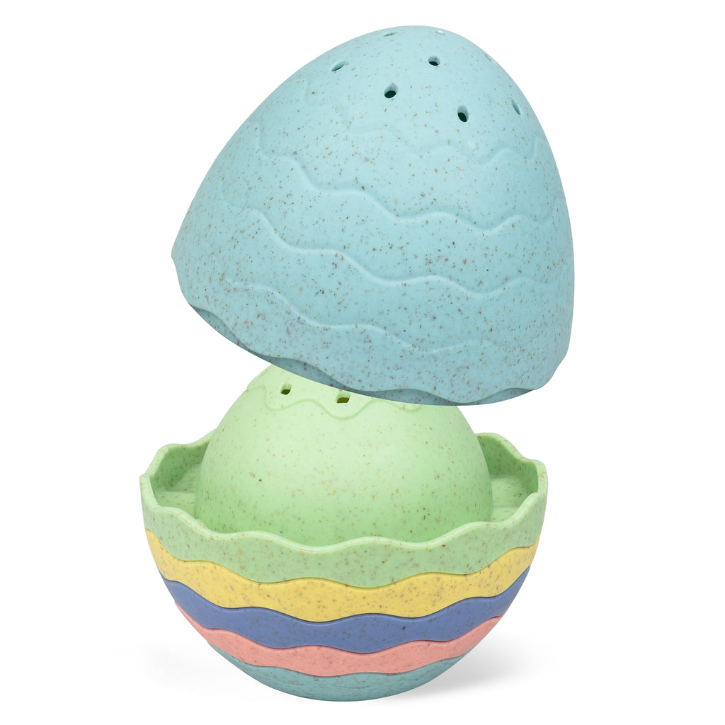 Bath Egg shown with top section removed, revealing inner stacking cups and playful pastel colours designed for bath-time fun.