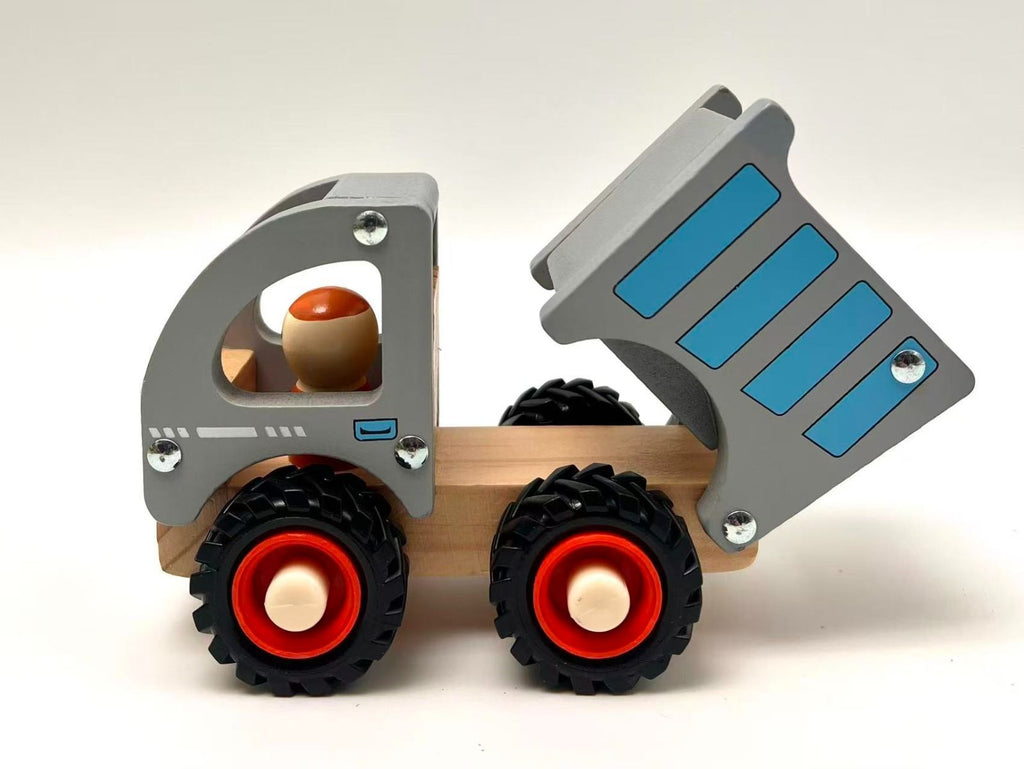 Wooden toy truck with gray bed and red wheels on a white background