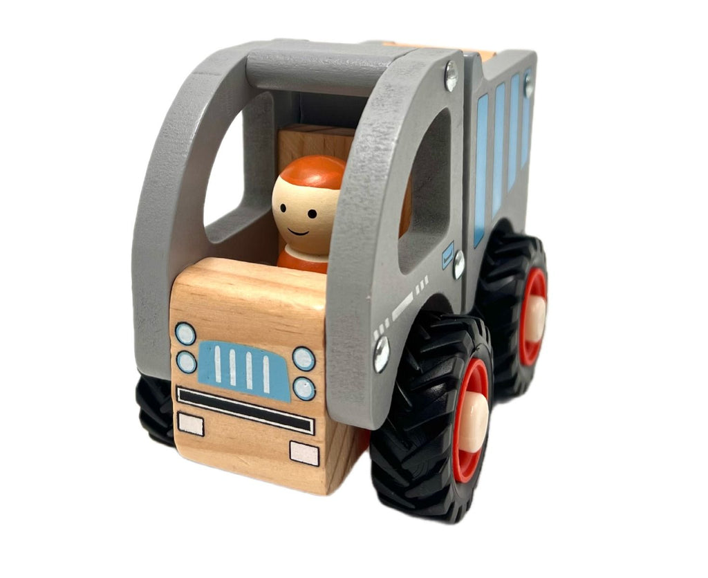 Wooden toy truck with a driver figure on a white background