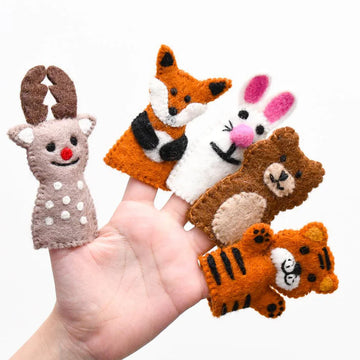 Hand holding five felt finger puppets including a reindeer, fox, rabbit, bear, and tiger from the woodland animals set.