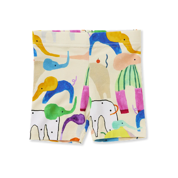 Flat lay of Halcyon Nights Happy Herd Kids Bike Shorts featuring colourful abstract animal print on a light background, made from organic cotton.