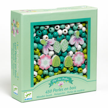Top-down image of 450 wooden beads in green, pink and yellow tones, including leaf and flower-shaped charms, packaged in a Djeco box.