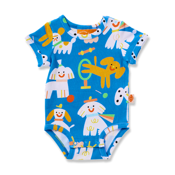 Flat lay of Halcyon Nights Puppy Park Short Sleeve Bodysuit featuring a bright blue base with colourful puppy, sunshine, and toy illustrations.